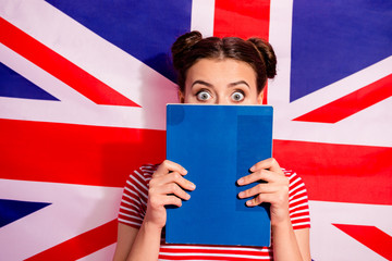 Close-up portrait of nice cute charming attractive funny afraid scared teen girl wearing striped...