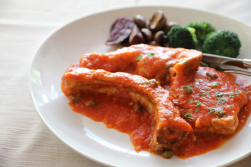 Pork chop steak with tomato sauce and mushroom , Italian food