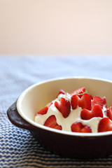 Strawberry with cream on table dessert