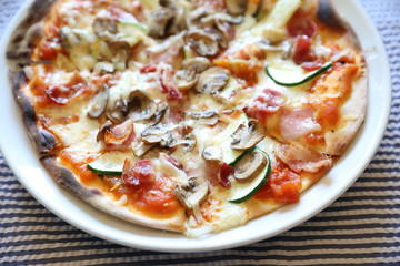 Pizza with bacon and mushroom , italian food
