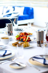 festive table setting on the yacht