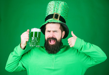 Thumbs up if you have a drink. Bearded man toasting to saint patricks day. Irish man with beard...