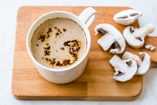 Mushroom Latte Coffee with Milk and Espresso on Wooden Board Ready to Drink.