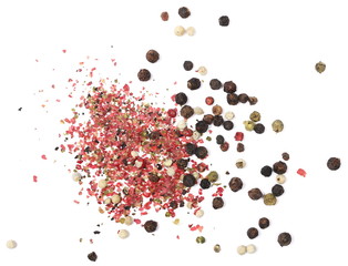 Colorful ground pepper and grains isolated on white background, top view