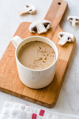 Mushroom Latte Coffee with Milk and Espresso on Wooden Board Ready to Drink.