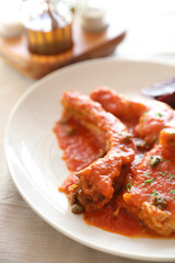 Pork chop steak with tomato sauce and mushroom , Italian food