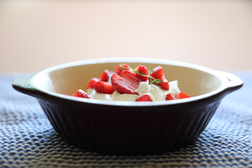 Strawberry with cream on table dessert