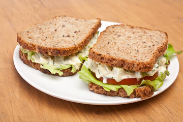 egg salad sandwiches on brown whole grain bread
