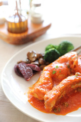 Pork chop steak with tomato sauce and mushroom , Italian food