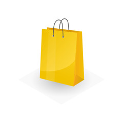 Big yellow paper colorful shopping or gifts bag isolated on white background