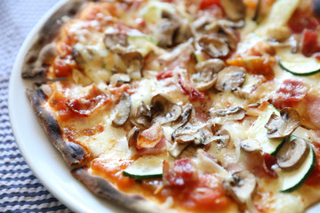 Pizza with bacon and mushroom , italian food