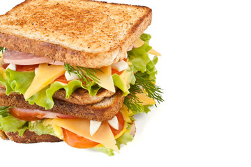 meat, lettuce , cheese and egg salad big sandwich on toasted bread