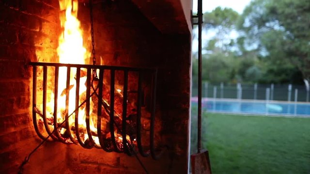 Uruguayan parrilla backyard grill wood burning