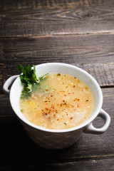 Fat meat soup with lamb based broth, chickpea and potatoes. Selective focus.