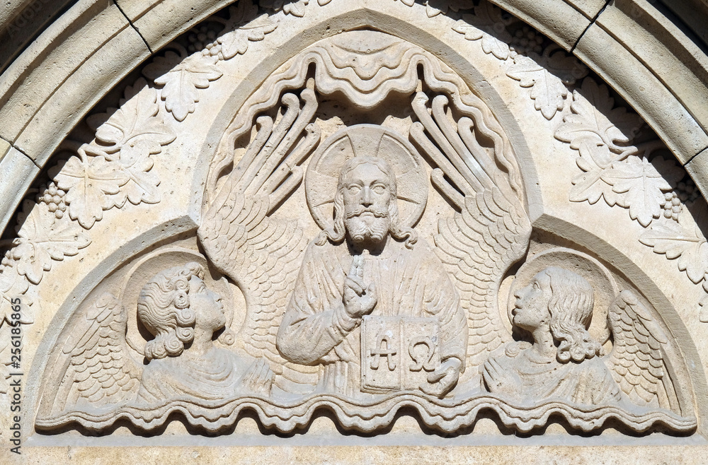 Wall mural Relief of Jesus the Pantocrator from side portal of church of St. Matthias near the fisherman bastion in Budapest, Hungary