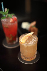 Orange cocktail at bar