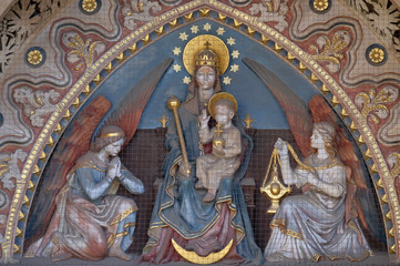 Virgin Mary with baby Jesus and Angels, statue from portal of the church of St. Matthew near the...