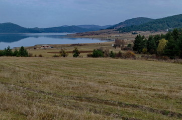 Fototapeta premium Batak dam with rest homes at the Rodopi mountain Bulgaria