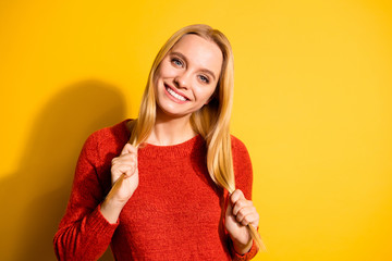 Close-up portrait of her she nice-looking cute attractive sweet delicate tender lovable lovely cheerful cheery girl making ponytails pigtails isolated over bright vivid shine orange background