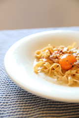 Homemade pasta with white sauce , spaghetti carbonara , italian food