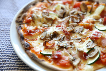 Pizza with bacon and mushroom , italian food