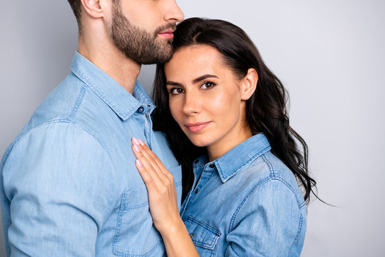 You are mine forever Cropped portrait of beautiful attractive casual lady cuddling her mr right wearing denim shirt isolated on grey background 