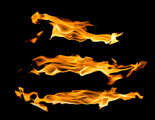 three yellow bright flame lines on black