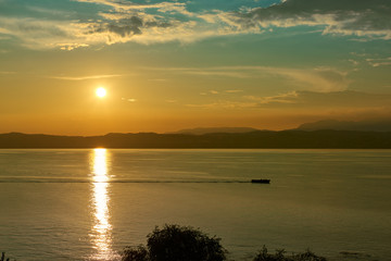 Beautiful sunset in Sirmione the historical town on peninsula in Garda lake, Lombardy, Italy