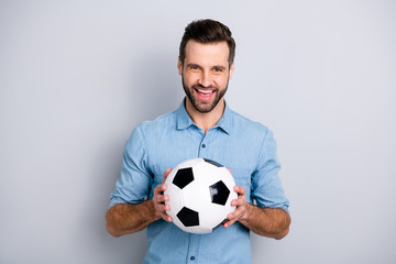 Close up photo macho he him his guy hold football white black leather ball watch match game true...