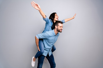 Close up side profile photo funky cheer she her he him his couple lady guy best friends piggyback...