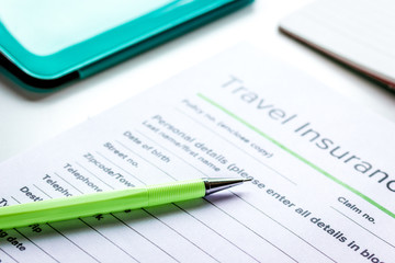 booking travel concept with insurance on table background