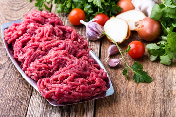 Minced beef, raw ground meat with cooking ingredients