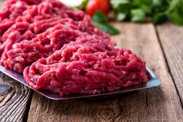 Minced beef, raw ground meat with cooking ingredients