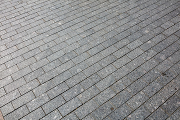 Stone blocks on the road as an abstract background