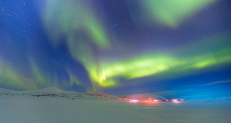 Northern lights in the sky over Tromso, Norway 