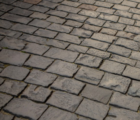 Stone blocks on the road as an abstract background