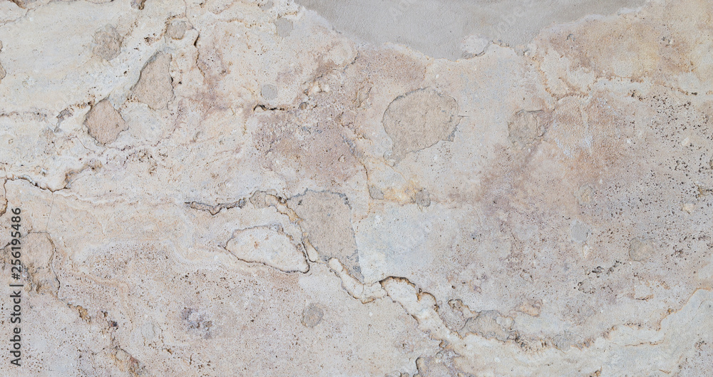 Poster full frame texture background of a weathered and abstract light brown stone slab.