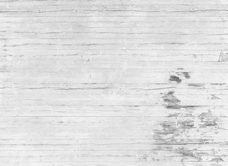 High resolution full frame background of a weathered wooden wall or wood panelling in black and...