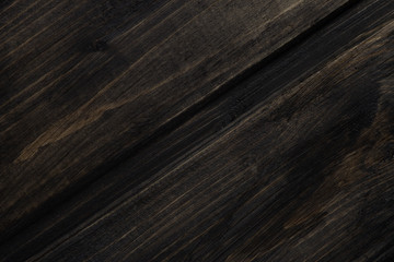 Wooden background painted black with a diagonal stripe