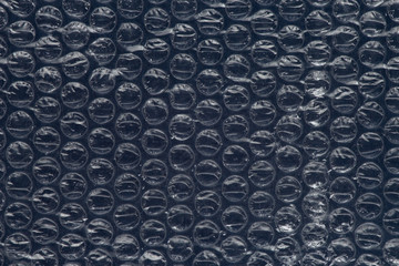 Shipping film with bubbles on a blue background