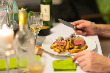 Beef tenderloin, morels and ratte potatoes for christmas diner. French speciality for festive Christmas celebration.