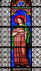 Obraz premium Saint Genevieve, stained glass windows in the Saint Germain des Pres Church, Paris, France 