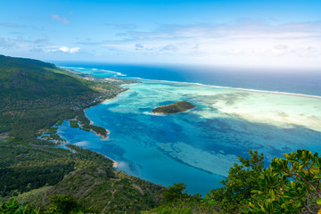 Fototapeta na wymiar Beautiful view of a tropical beach with crystal clear water from the mountain in le Le Morne Brabant, Mauritius