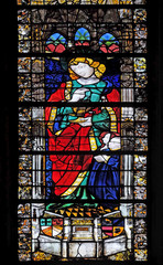 Saint John the Evangelist, stained glass window in Saint Severin church in Paris, France 