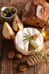 camembert with walnut, olive and honey