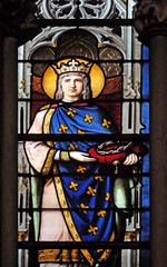 Obraz na płótnie Canvas Saint Louis with the Crown of Thorns, stained glass window in Saint Severin church in Paris, France 