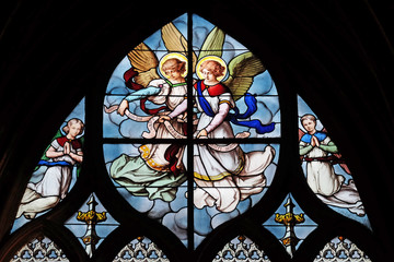Angels, stained glass window in Saint Severin church in Paris, France