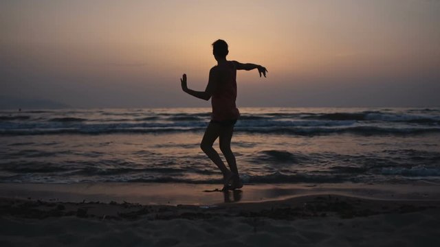 Funny dance at sunset