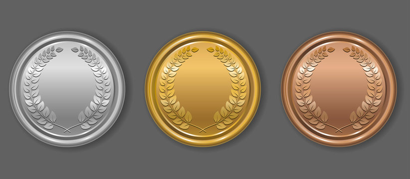 Gold, silver and bronze award medals with laurel wreath. Blank medals set. Blank of coins. Vector illustration.