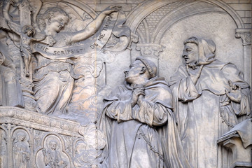 Relief on the portal of Saint Thomas Aquinas in Paris, France 